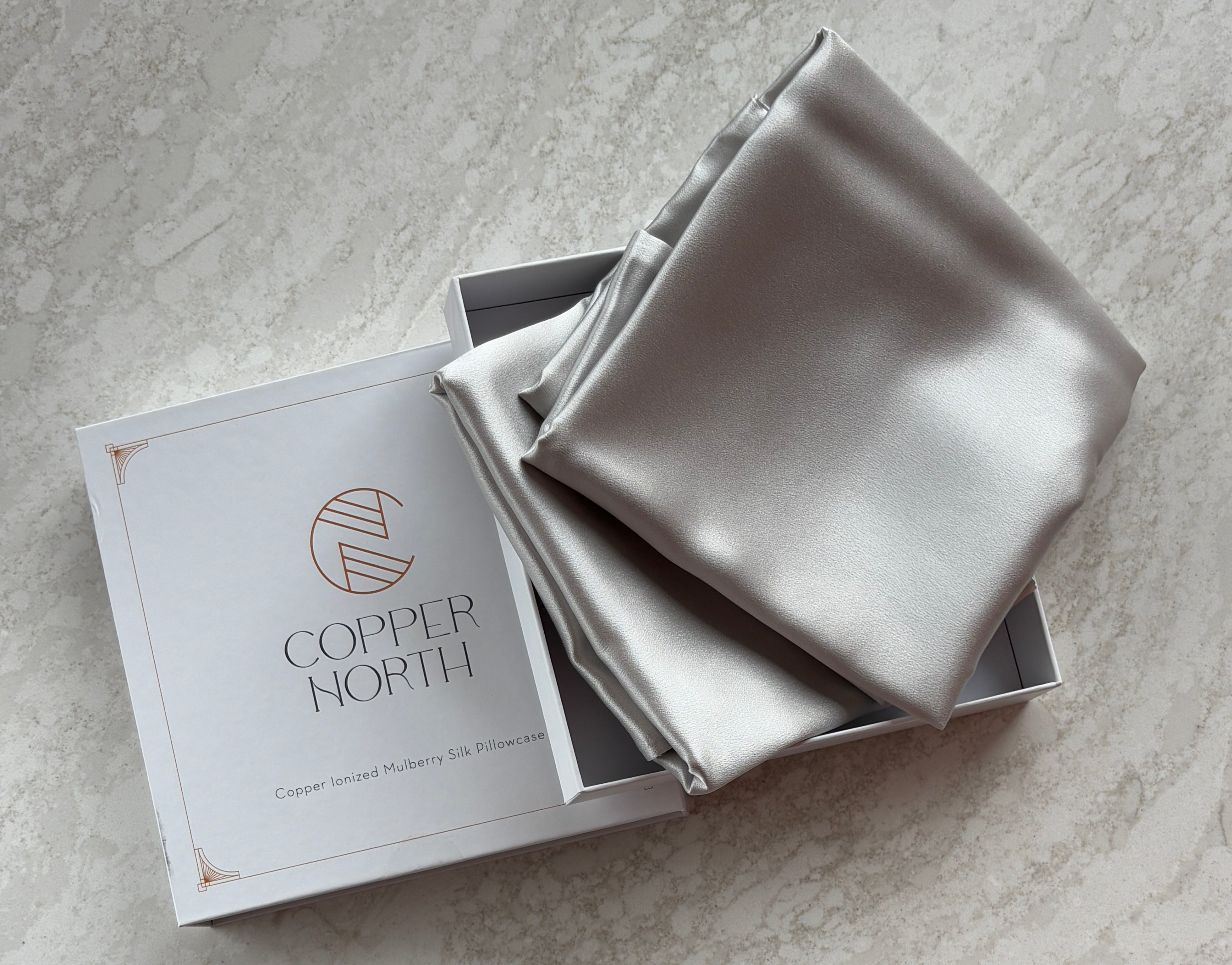 Light gray 100% silk pillowcases infused with copper