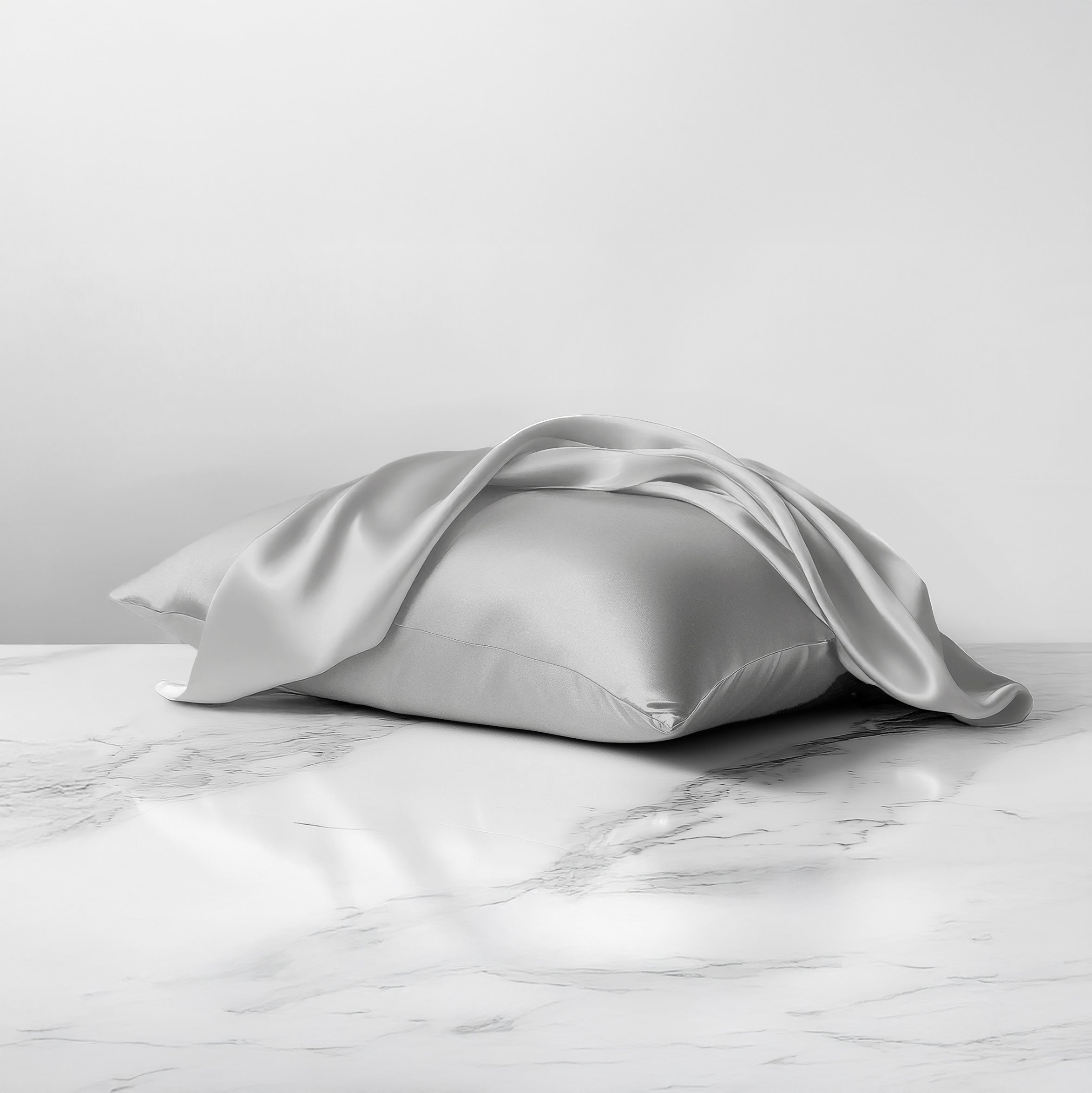 Light gray 100% silk pillowcases infused with copper