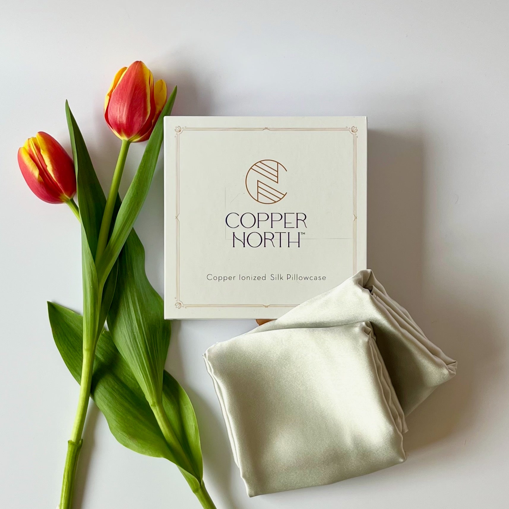 Copper North pearl gray silk pillowcases with red tulips on a light background