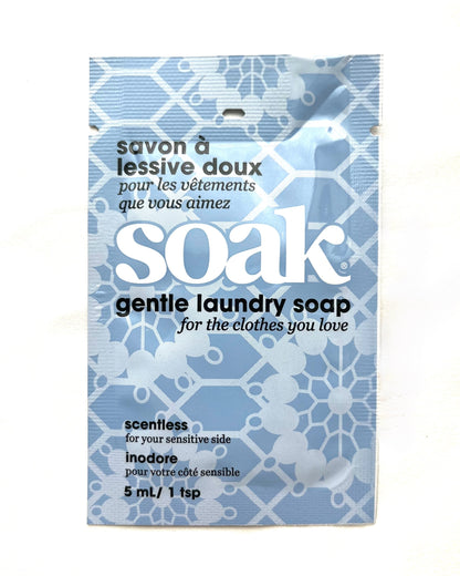 SOAK gentle laundry soap packet with blue and white design