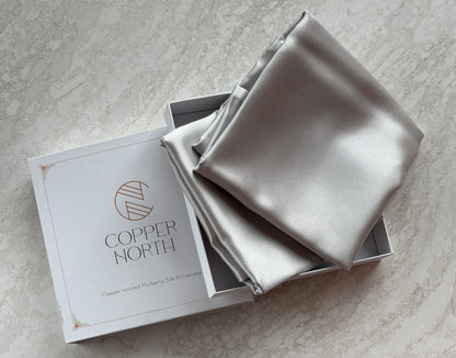 Light gray 100% silk pillowcases infused with copper
